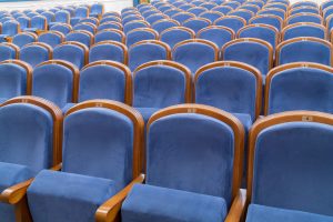 Empty theater chairs before act two