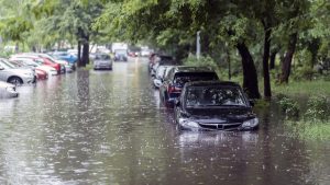 flooded street with submerged cars